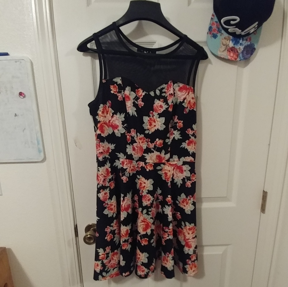 Short floral dress with sheer top